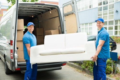 Professional removals in Neweltham with moving van and packed boxes